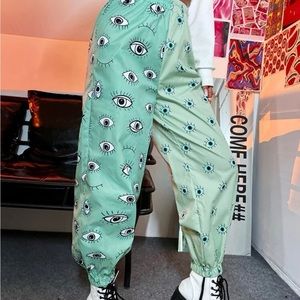 Eye print tapered pants